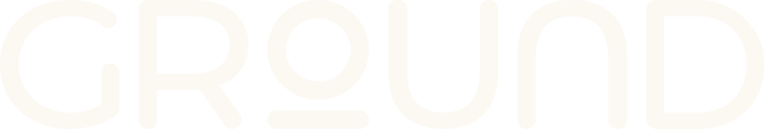 Close-up of a black and white graphic with the word 'GROUND' in bold, stylized font.