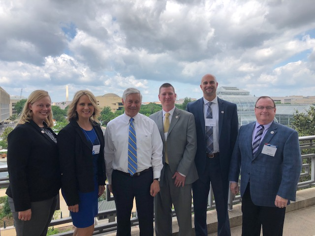 Lansing day on the hill with other NAIFA members.png