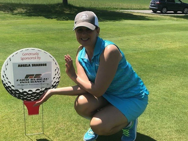 Angela Golfing.jpg