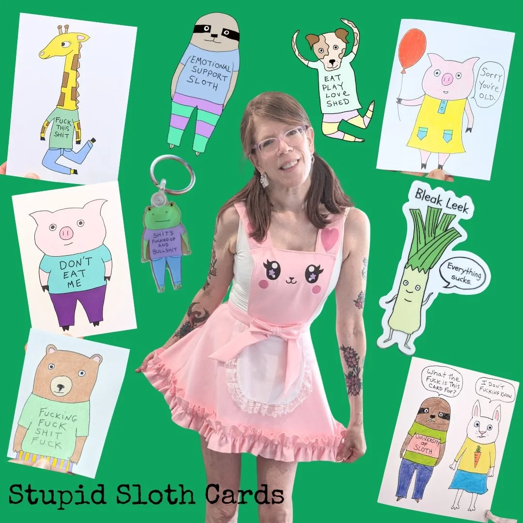 A woman dressed in a pink apron with cartoon sloth and pig designs is surrounded by various illustrated cartoon sloth and animal cards with humorous and vulgar messages, on a green background. The text at the bottom reads "Stupid Sloth Cards."
