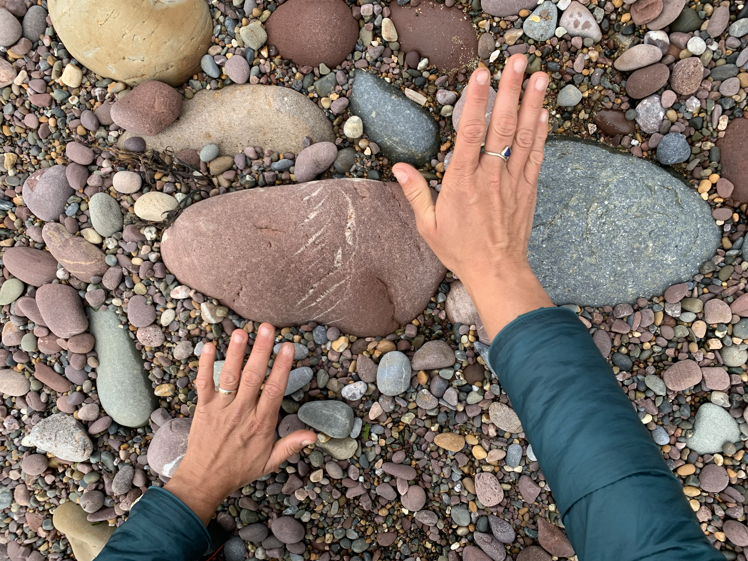 Water entering rock when stretched and split by great geological movements. High silica content creating crystalising in rock. 