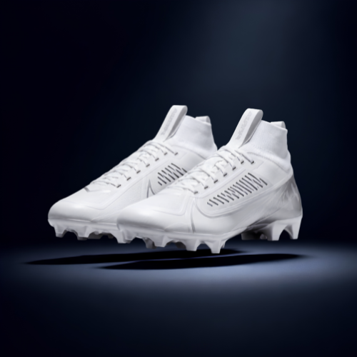 White soccer cleats with high ankle support and cleats on the sole, placed against a dark background.
