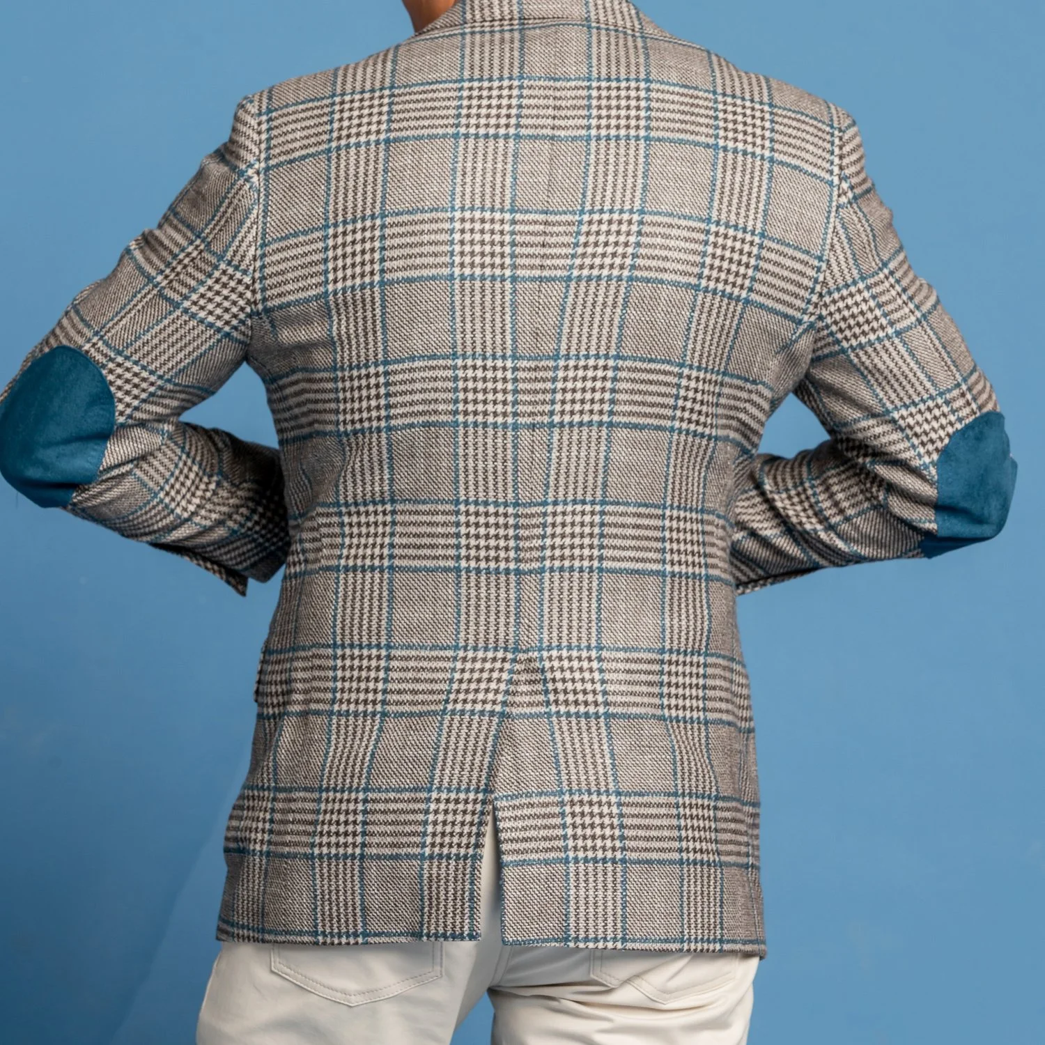 Textured custom blazer showcasing premium fabric and tailored fit.