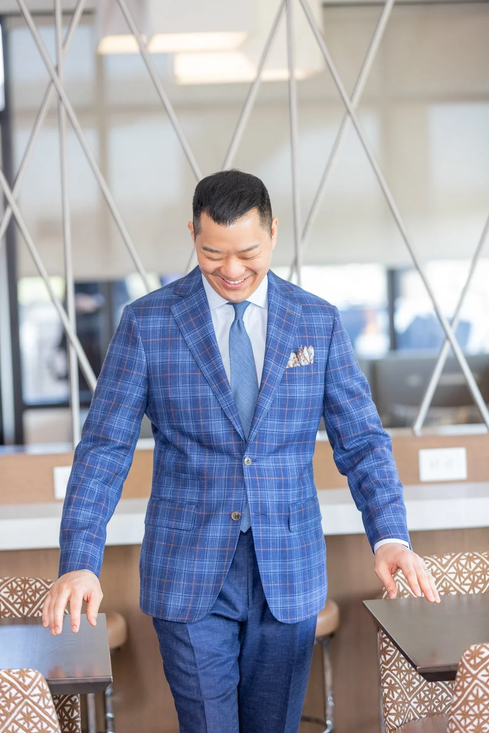 Blue custom suit tailored for a sharp, modern silhouette in Columbia.