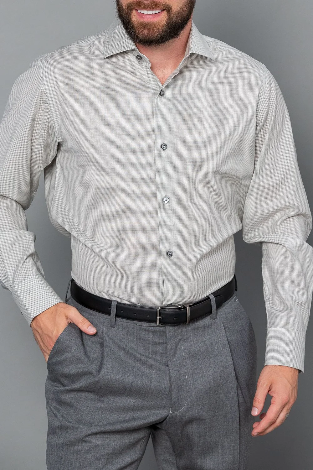 Close-up detail of custom shirt collar and cuff craftsmanship.