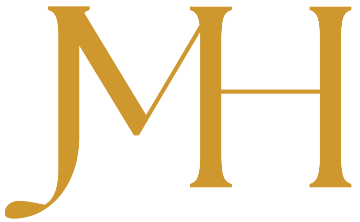 A large, stylized monogram with the letters JMH in gold color.