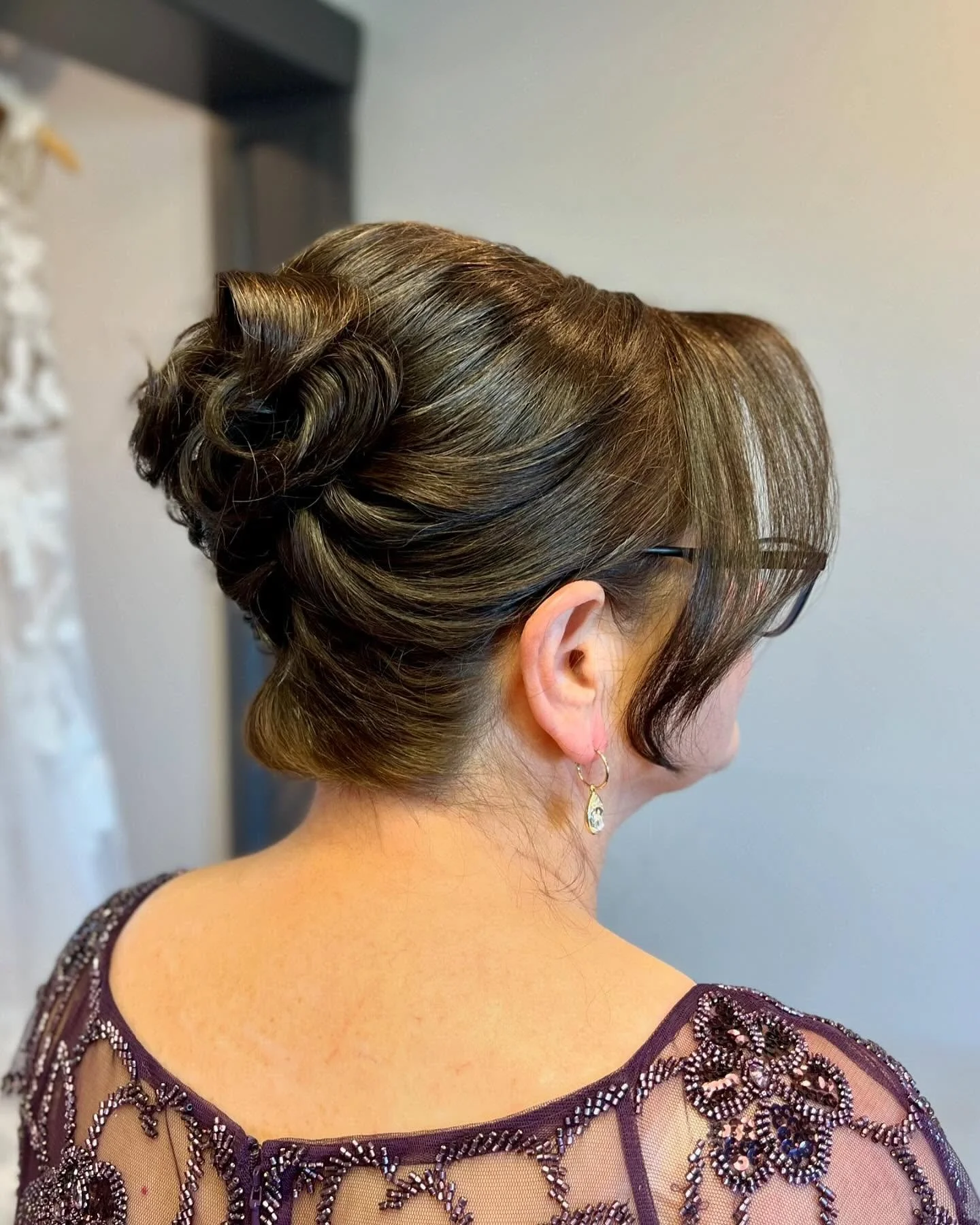 Emily&rsquo;s mother showed me a picture of a traditional French twist and said she trusted me to make her look special for her daughter&rsquo;s wedding. I thought styling her hair in one of the year&rsquo;s top looks would be perfect for her hair le