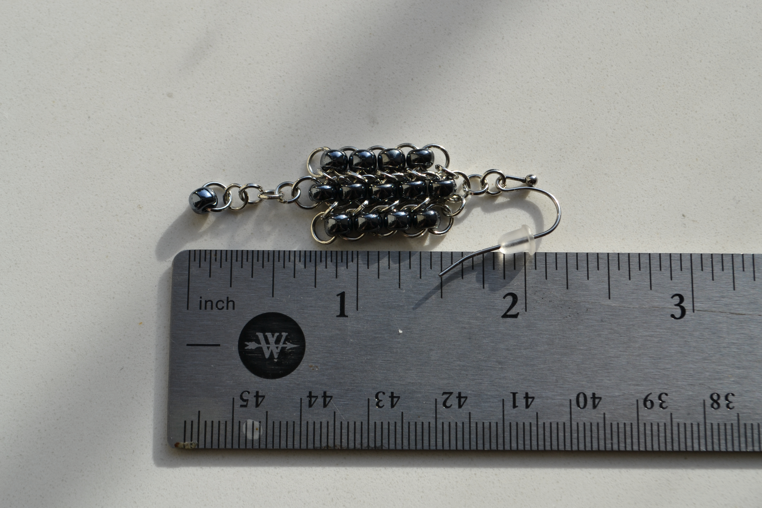 black bead chand ear 3.png