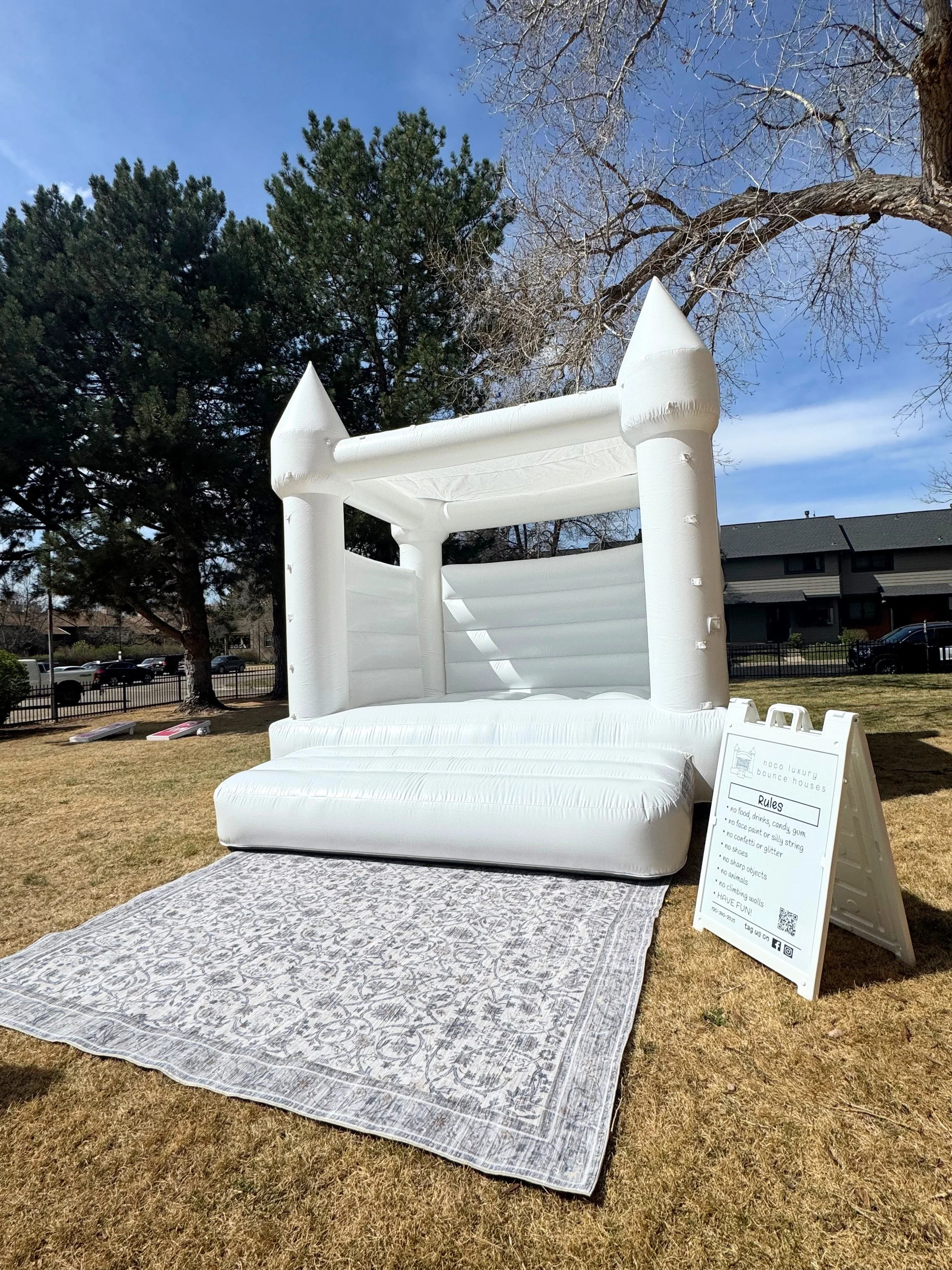 White modern wedding bounce house Fort Collins