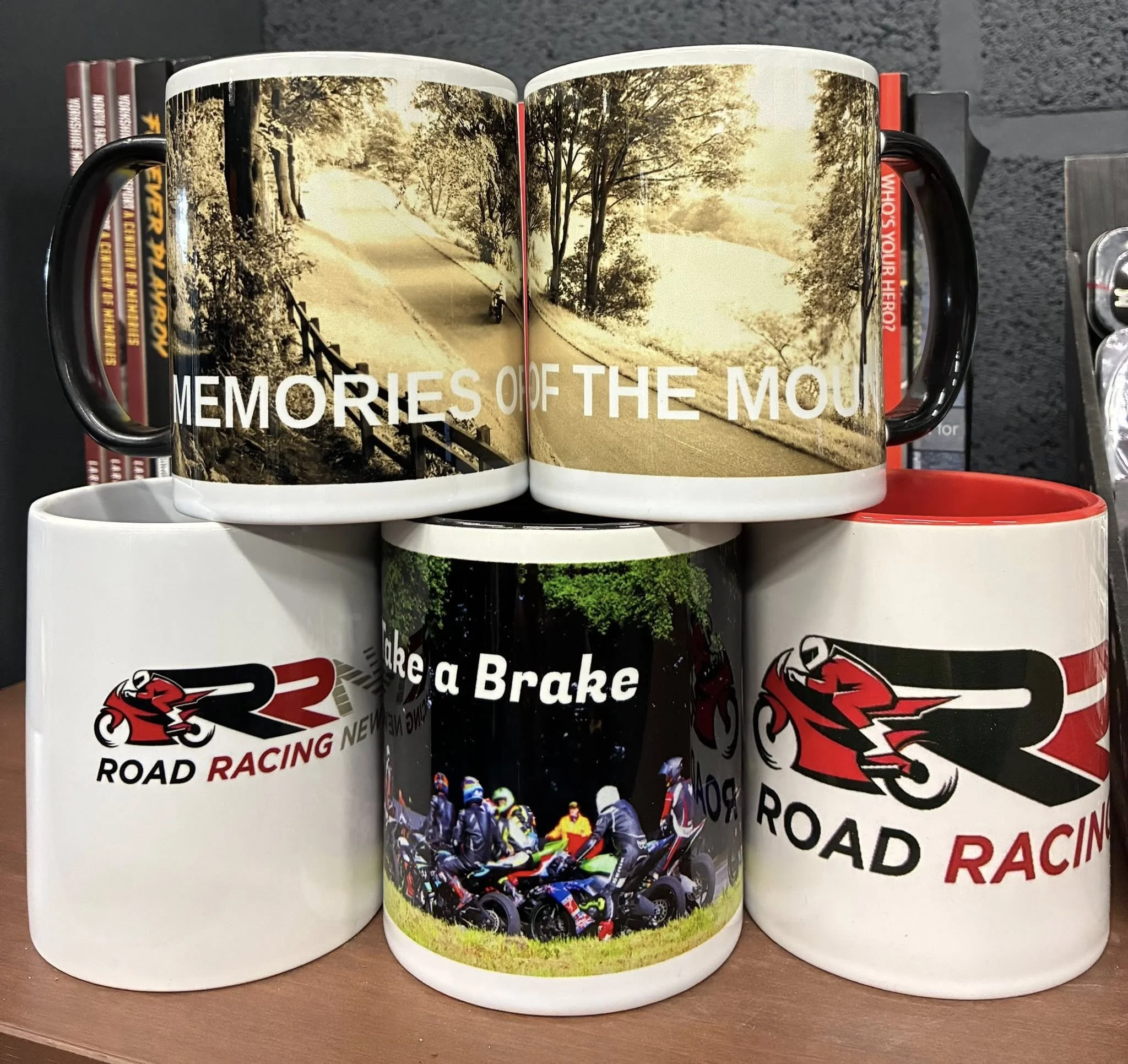 A photo of mugs with designs by Road Racing News