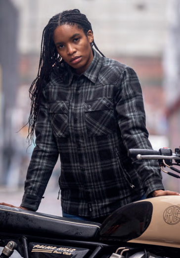 Photo of a lady wearing a grey checked shirt by Oxford Products