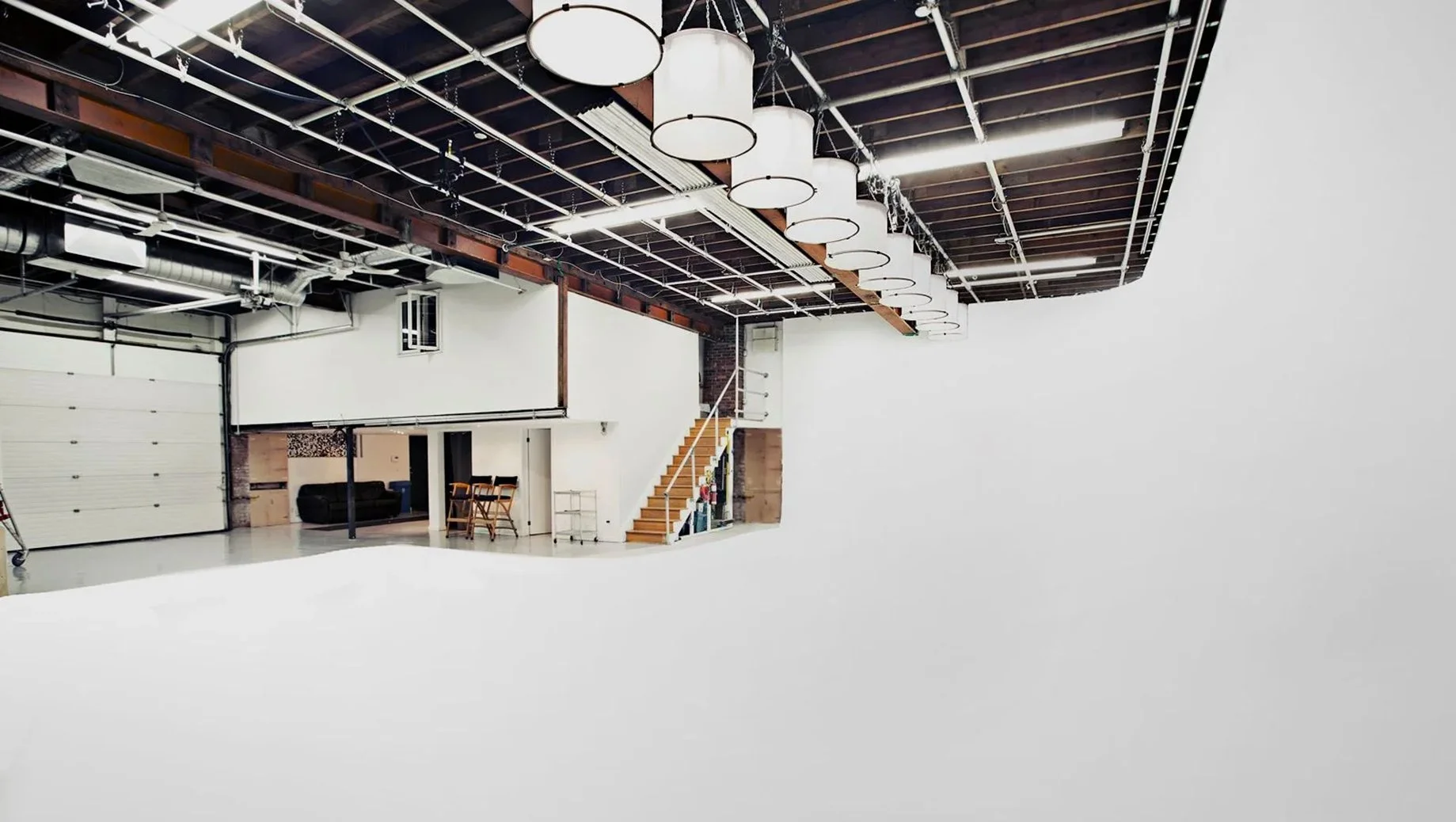 Main studio space at Sterling Studio, 4,250 sq ft Toronto soundstage featuring a 45' x 21' cyc wall.