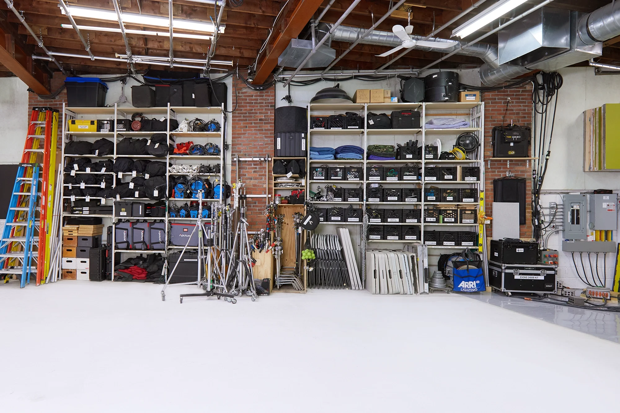 In-house equipment rental selection and organized gear wall at Sterling Studio in Toronto.