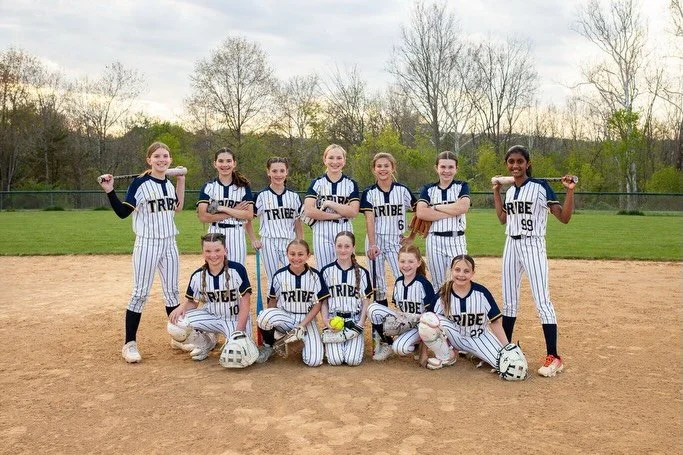 Always love getting this team lined up for photos. Coolest group of girls on and off the field 🥎🤍