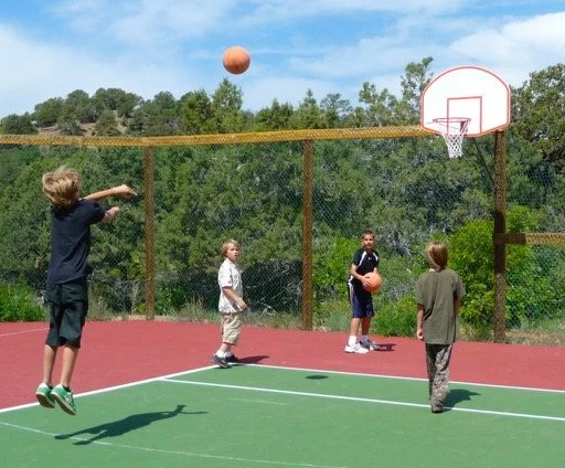 Killing time at the basketball court.