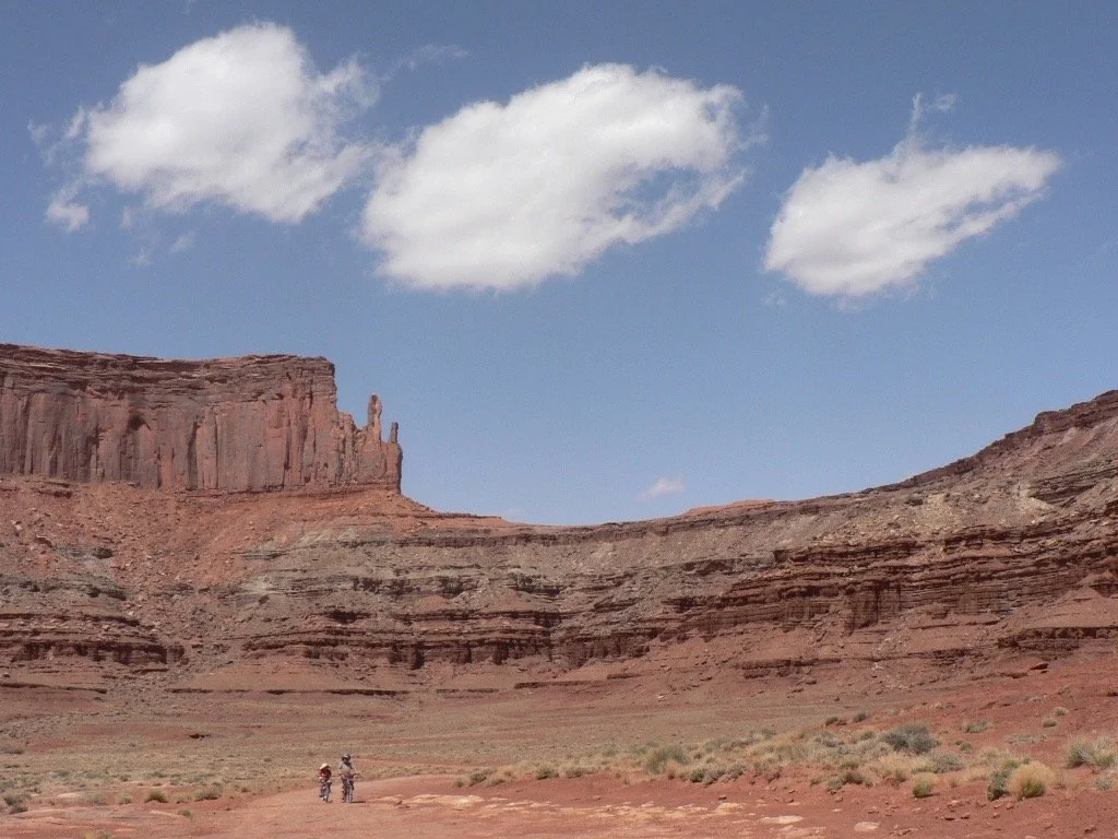 Kids biking the White Rim trail in nearby Canyonlands National Park.