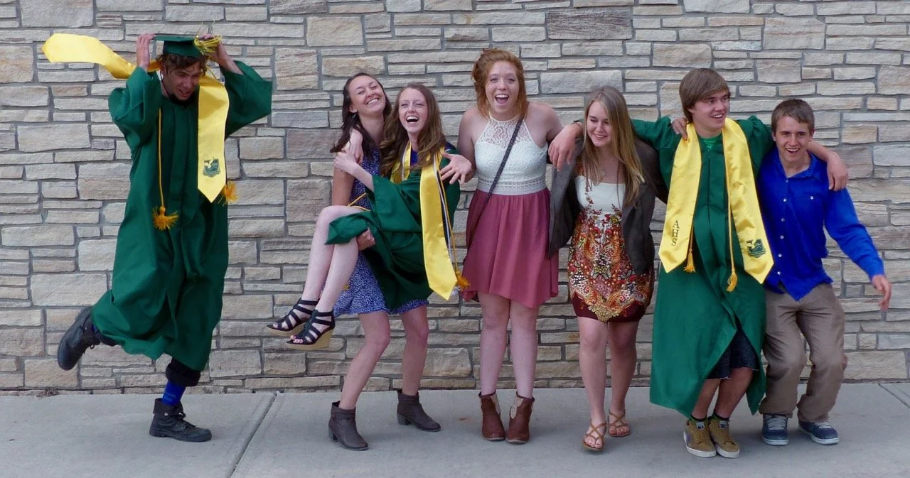 Many of the same kids celebrating high school graduation 12 years later.