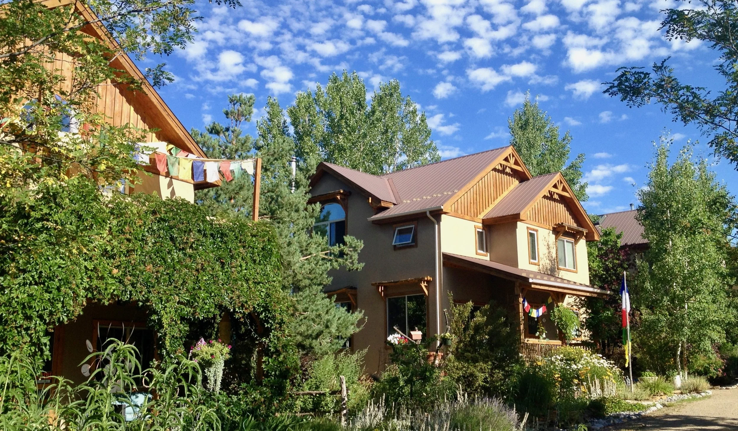 Homes on the north wing under a Colorado blue sky.