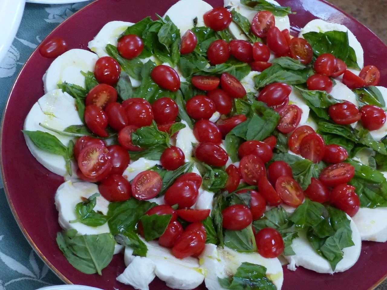 Bursting with flavor and color, fresh tomatoes and basil grown at Heartwood.