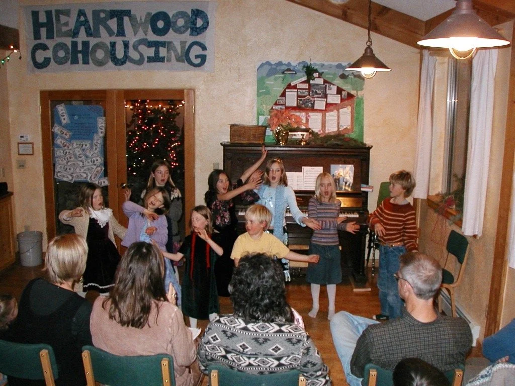 Kids music recital in the common house.