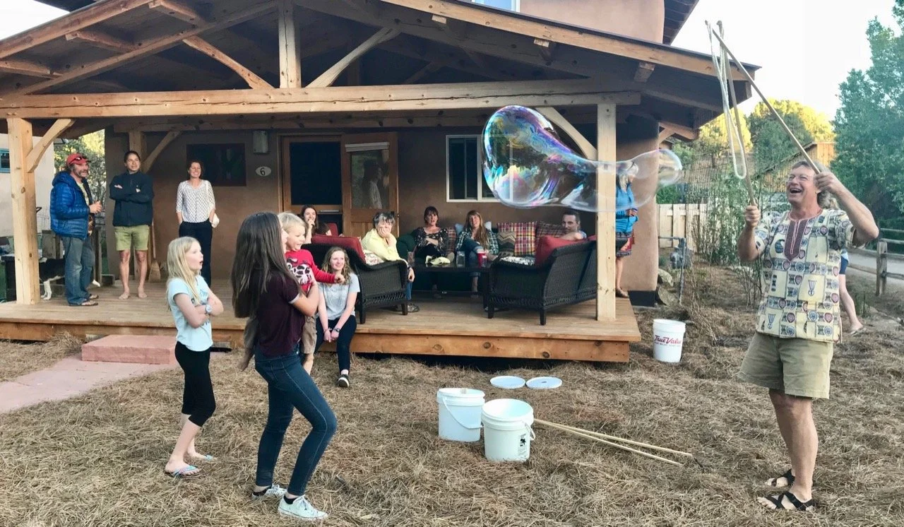 Blowing giant bubbles.