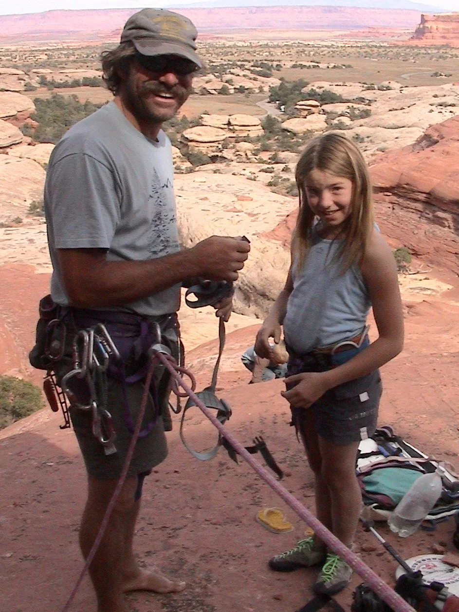 Father-daughter rock climbing.