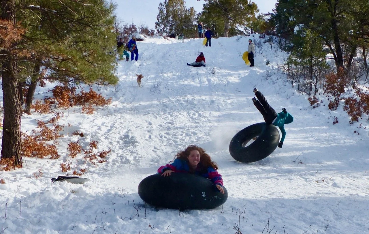 A bit of fun and mayhem on the sledding hill.