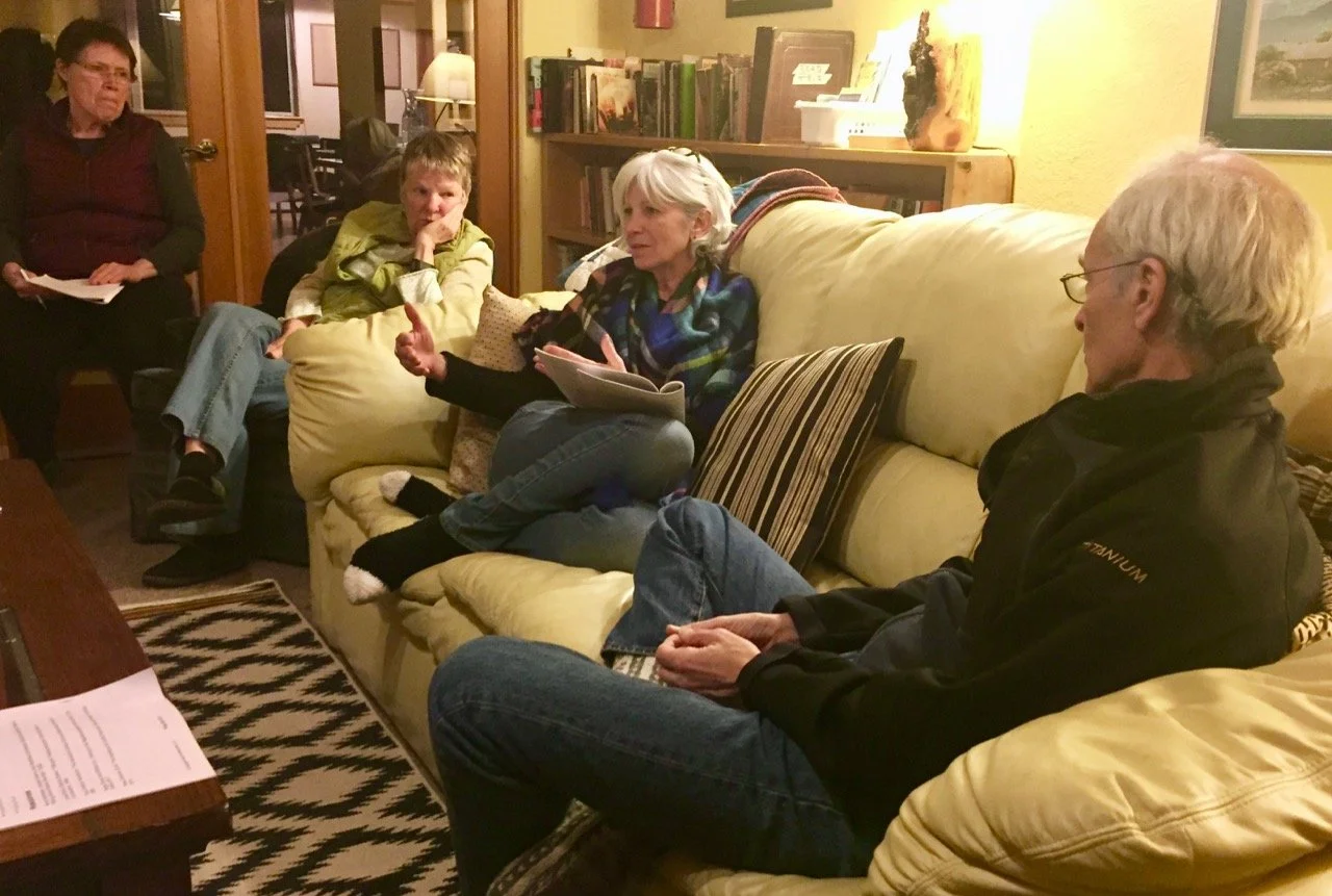 Conversing in the hearth room.