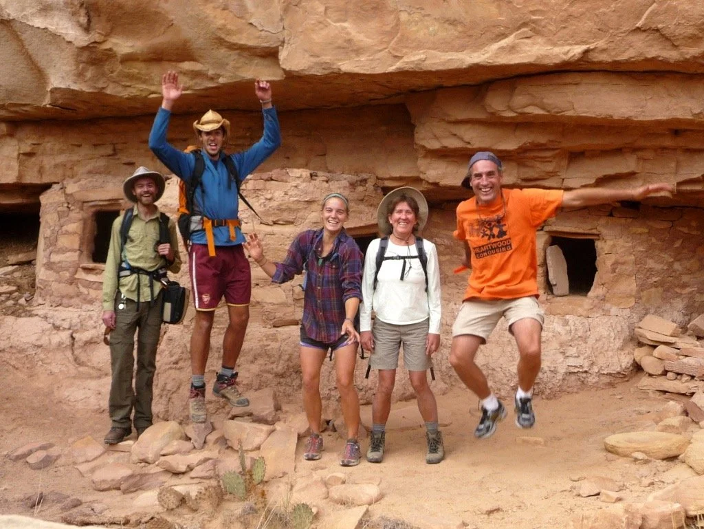 Jumping for joy while exploring Anasazi ruins.