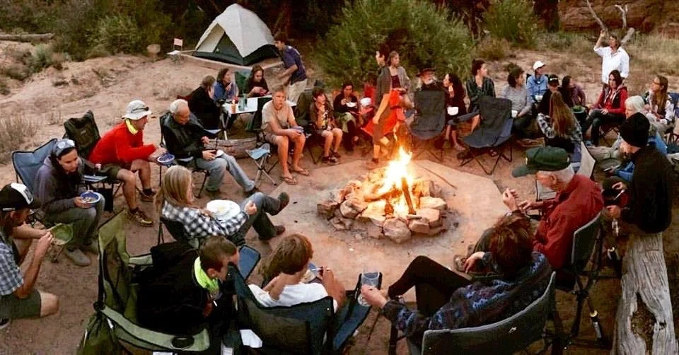 Sitting around the campfire at our annual Canyonlands campout.