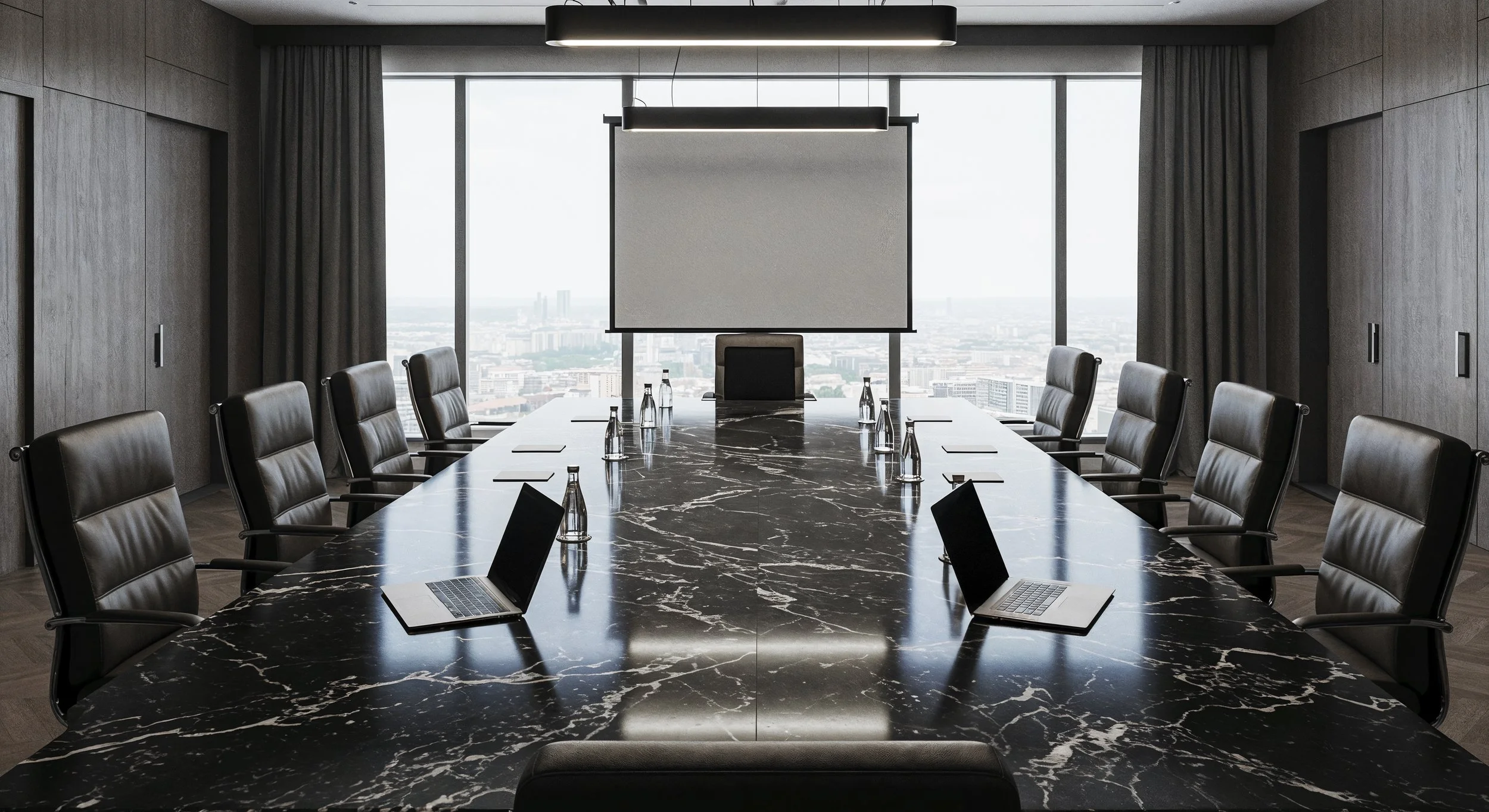 Empty modern conference room with a large black marble table, ten leather chairs, laptops, water bottles, a projector screen, and cityscape view through large windows.