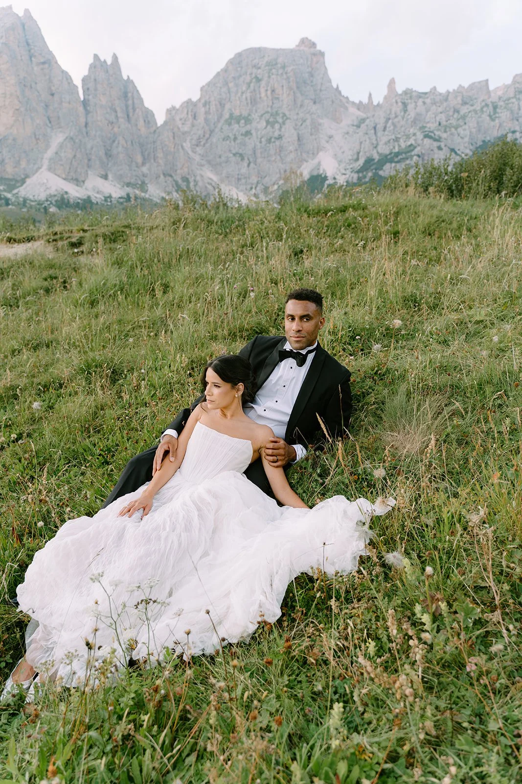 Bbride and groom in mountains during Dolomites elopement in Italy