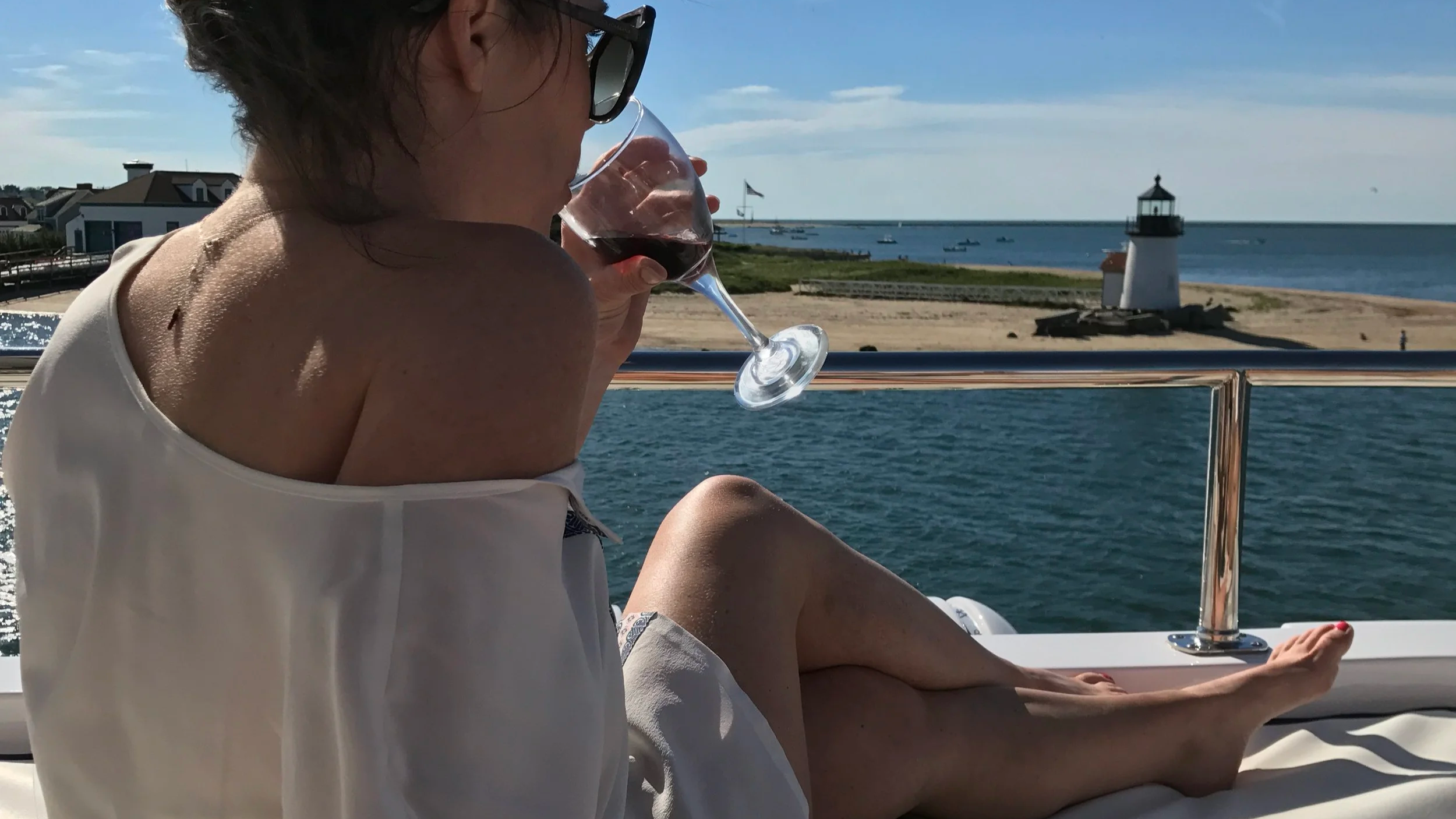 Sipping Champagne looking at Nantucket's Brant Point Lighthouse