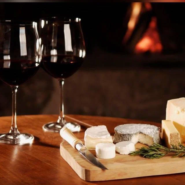 Cheese and wine in a Parisian apartment