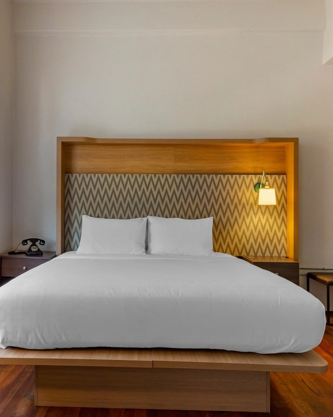 Unpack, unwind, and stay awhile. 🗝️ At the Inn at Blackstone, we believe your travel accommodations should feel like a true retreat. From soaring historic ceilings and plush bedding to thoughtful amenities and sunlit corners, our guest rooms are des