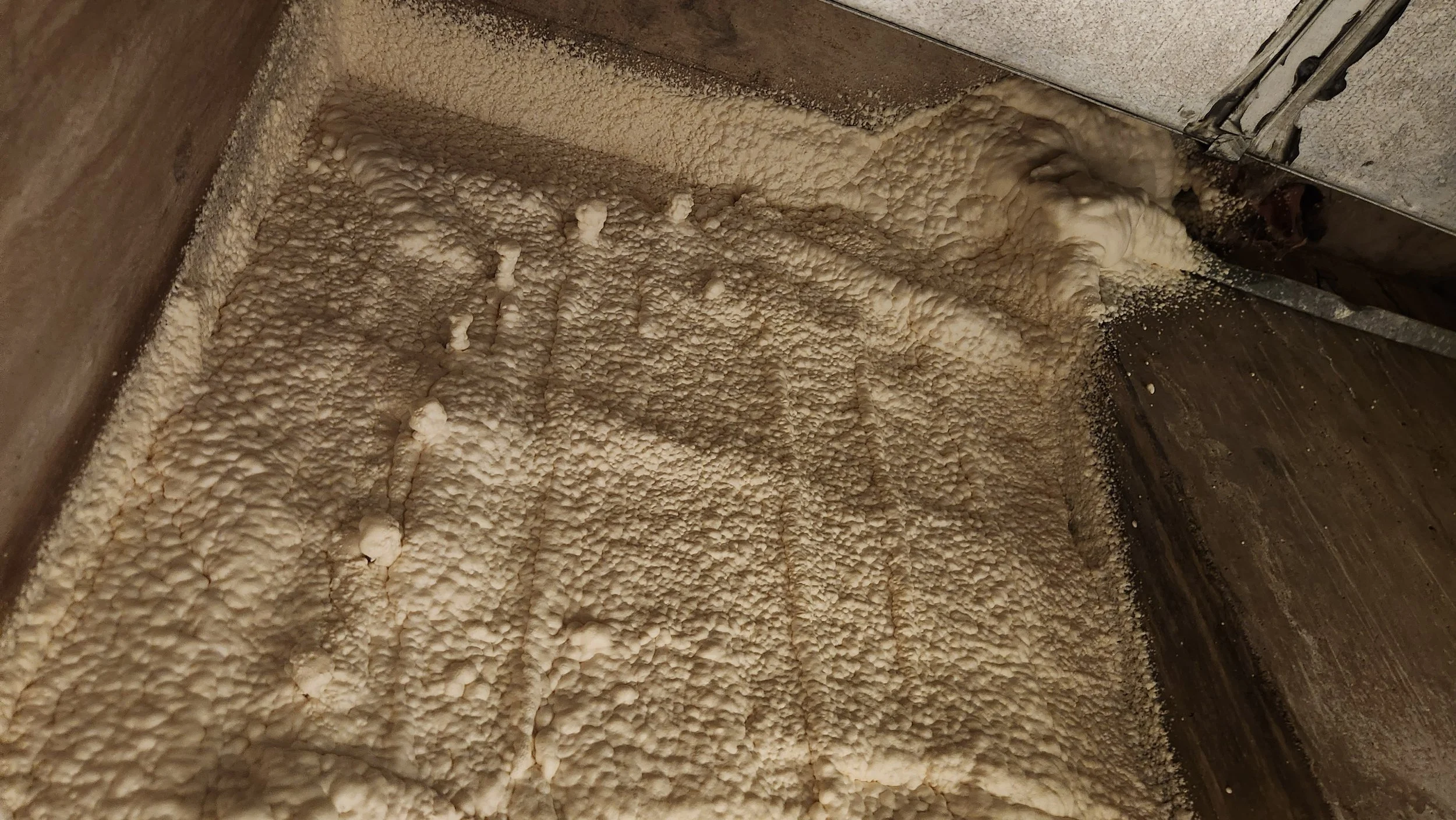 Poly Foam sealing interior wall over Hydro Poly injection.