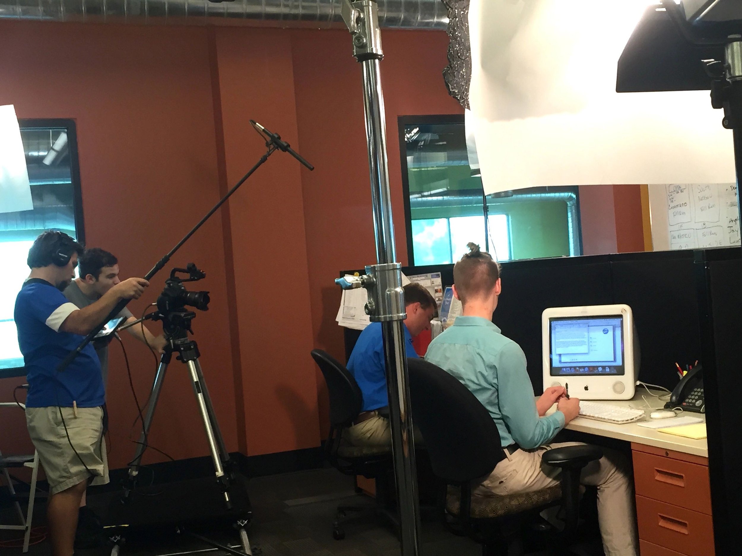 Christonikos Tsalikis and Max Hechtman filming the news office scene.