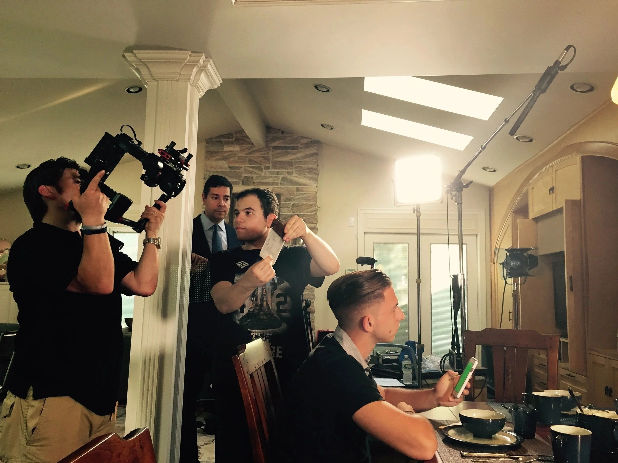 Christonikos Tsalikis and Max Hechtman film Nick Argyros for one of the scenes at home.