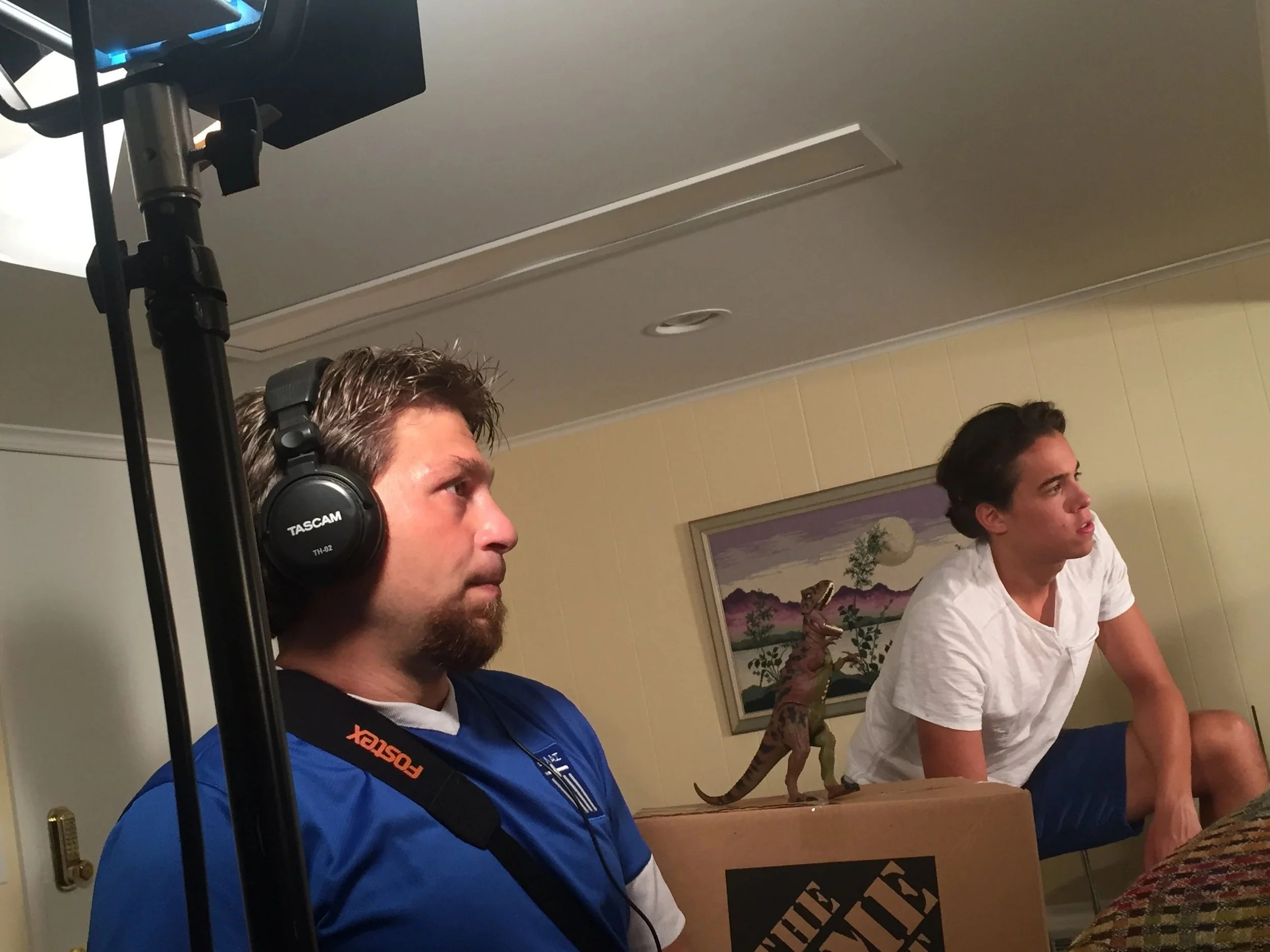Christonikos Tsalikis and Dylan Libby on set filming a scene.