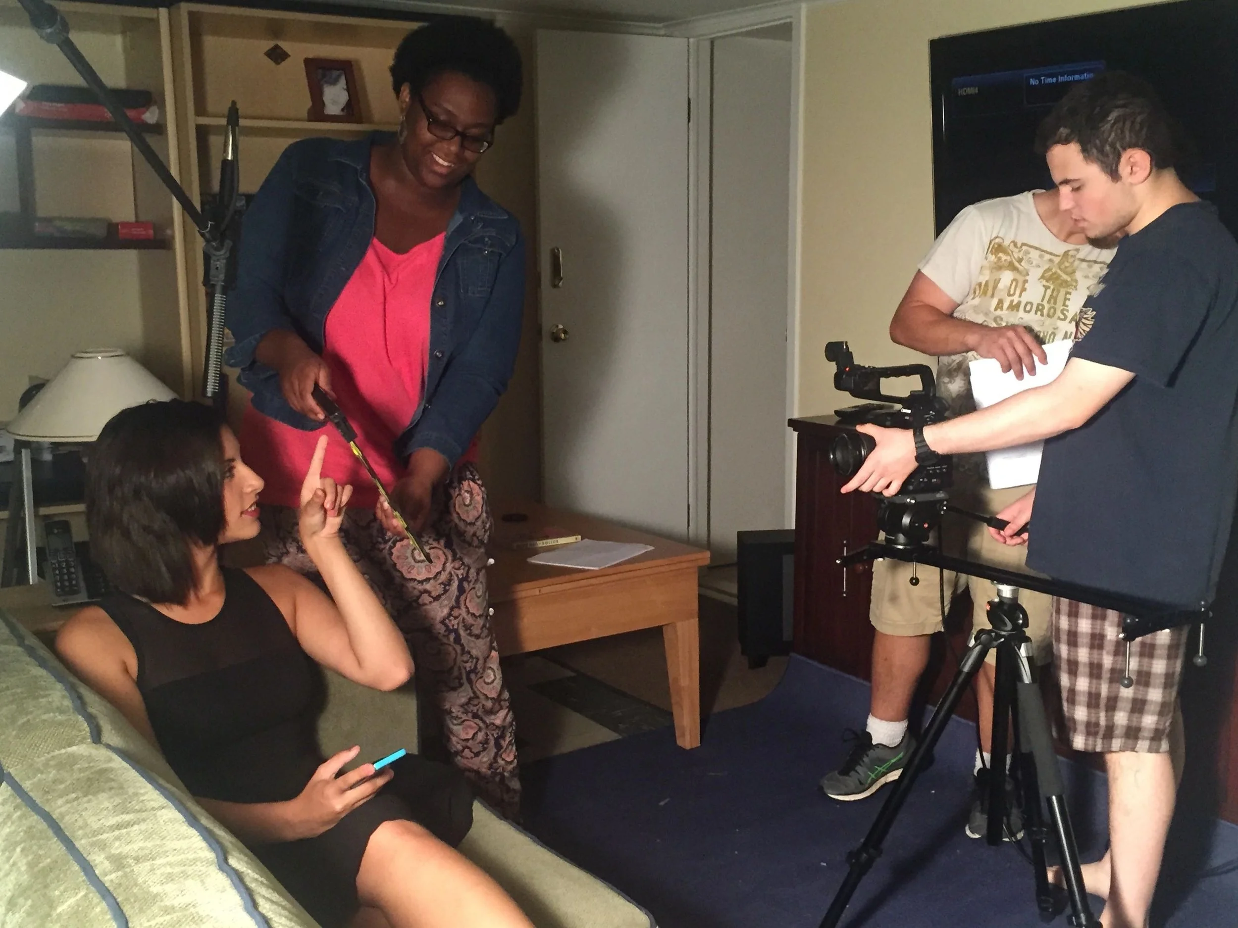 Max Hechtman readies a scene with Ariana Osmanzai while Michelle Williams does clapperboard.