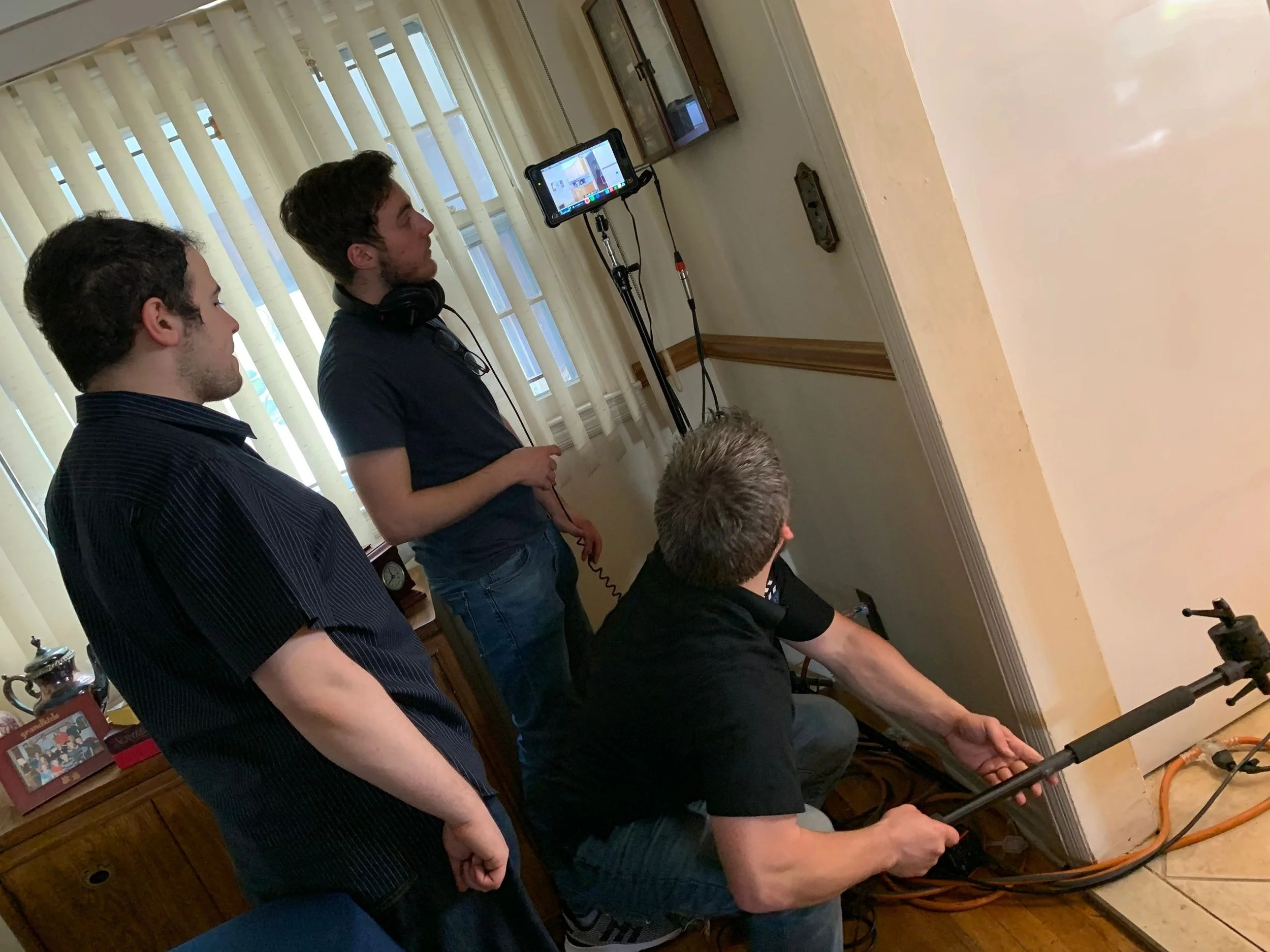 Max Hechtman, Christonikos Tsalikis and production assistant James Troici monitor the results for a scene.