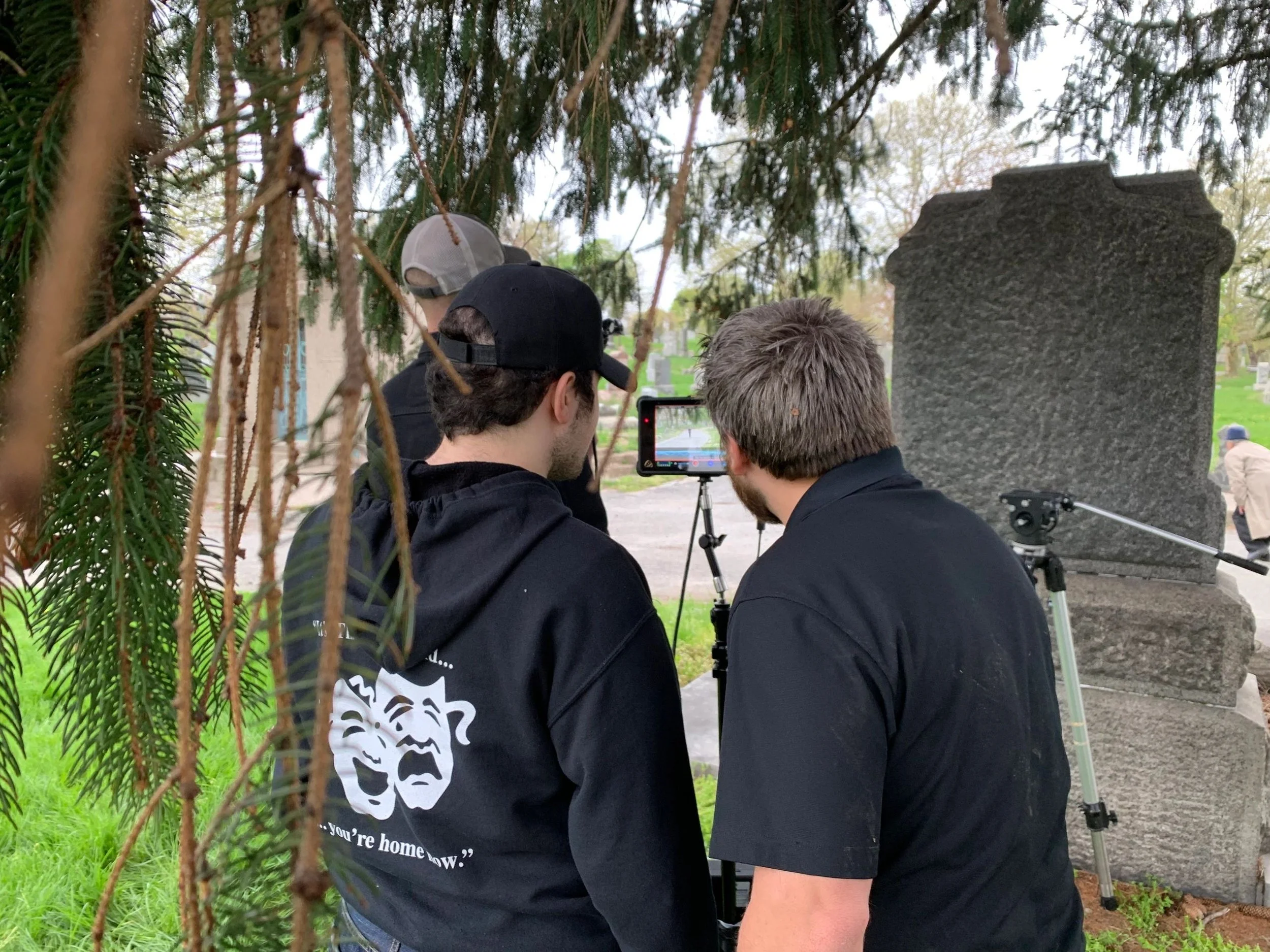 Max Hechtman and Christonikos Tsalikis monitor the filming of the cemetery scene.