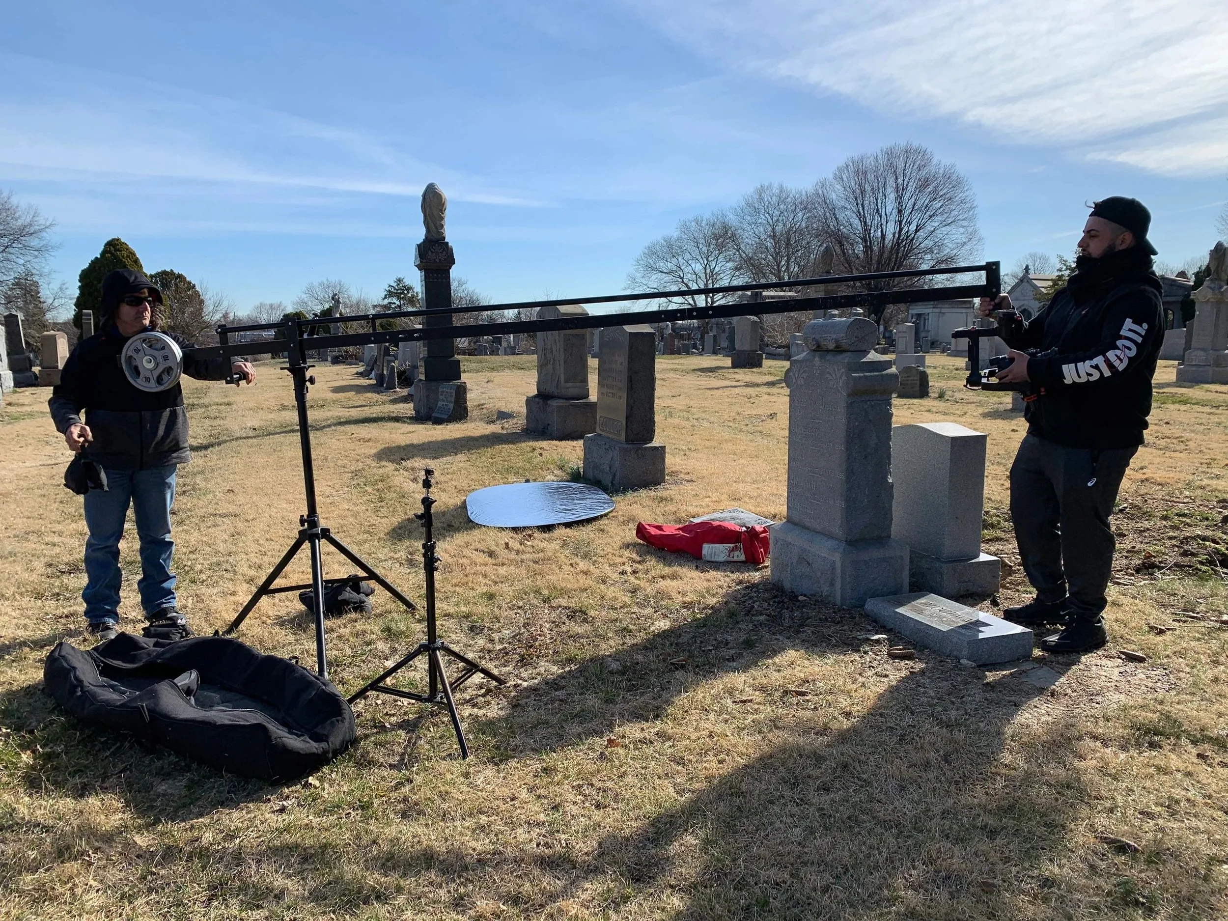 Co-director of photography Joe Daniele and production assistant Emmanuel Pantelidis set up the camera crane for the cemetery scene.