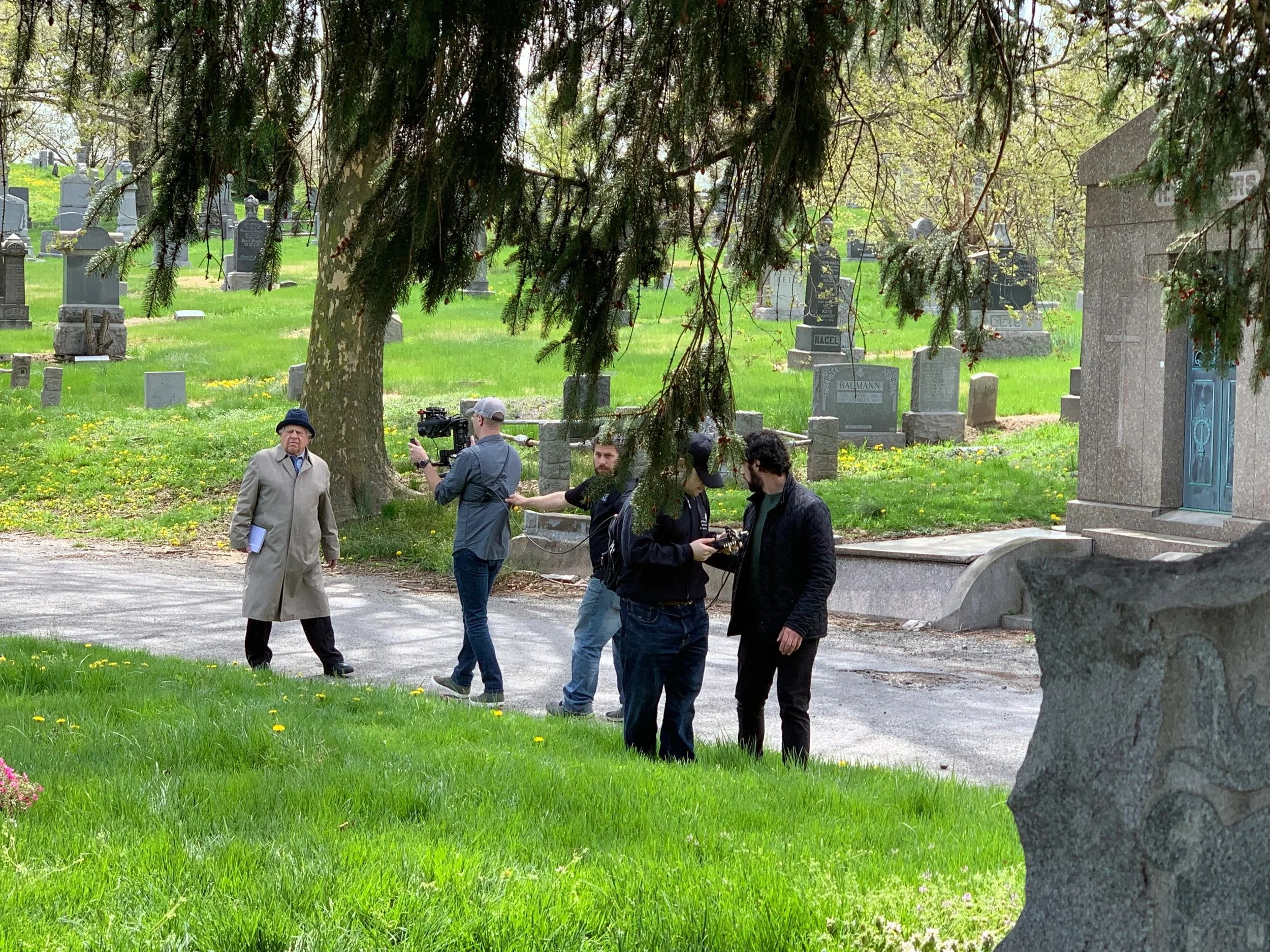 Co-director of photography Joe DeFelice, Christonikos Tsalikis, Max Hechtman and assistant director of photography Alberto Innella film a shot of Richie Allan during the cemetery scene.