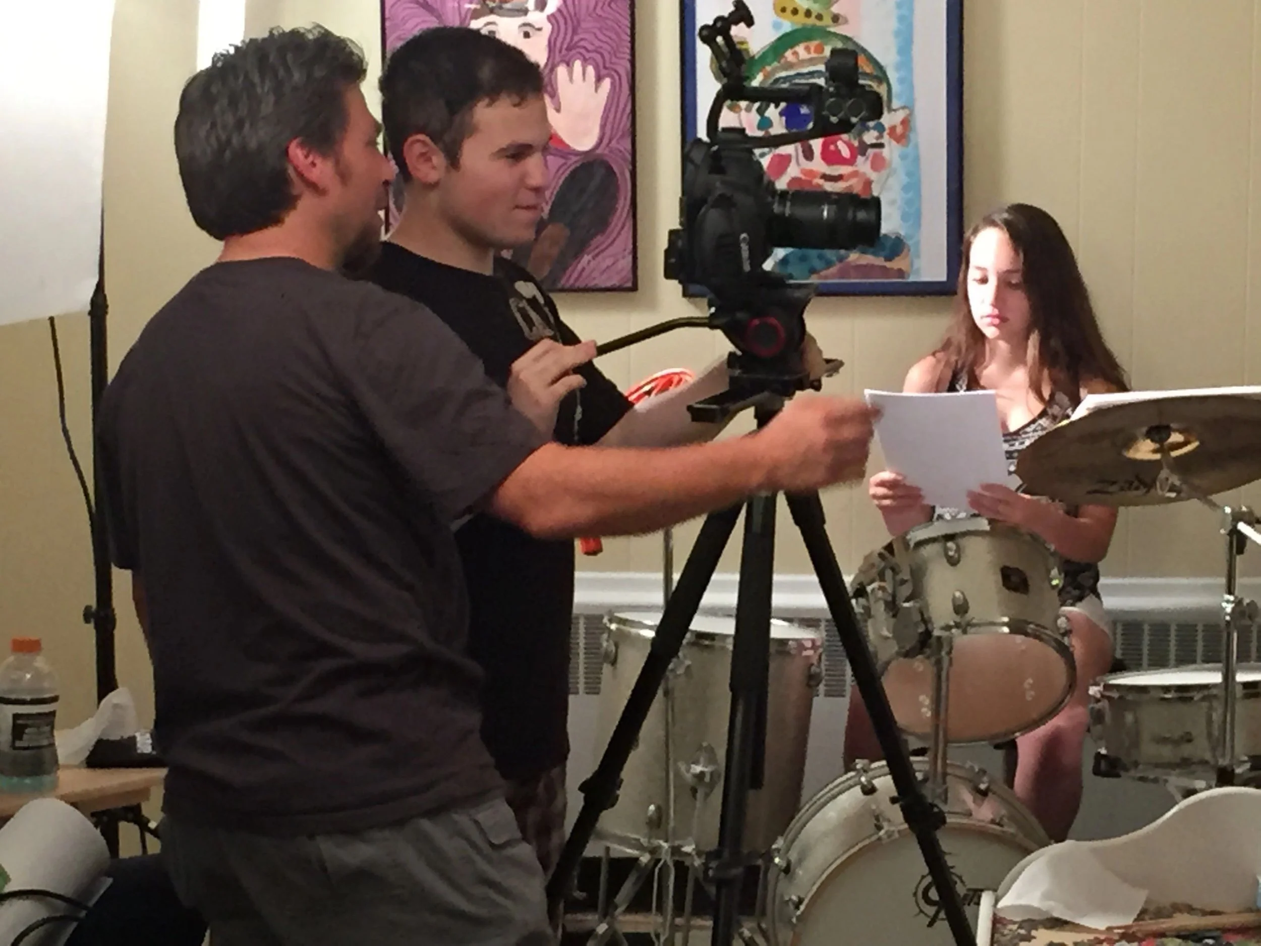 Christonikos Tsalikis mentors Max Hechtman while Rachel Steiner studies her lines.