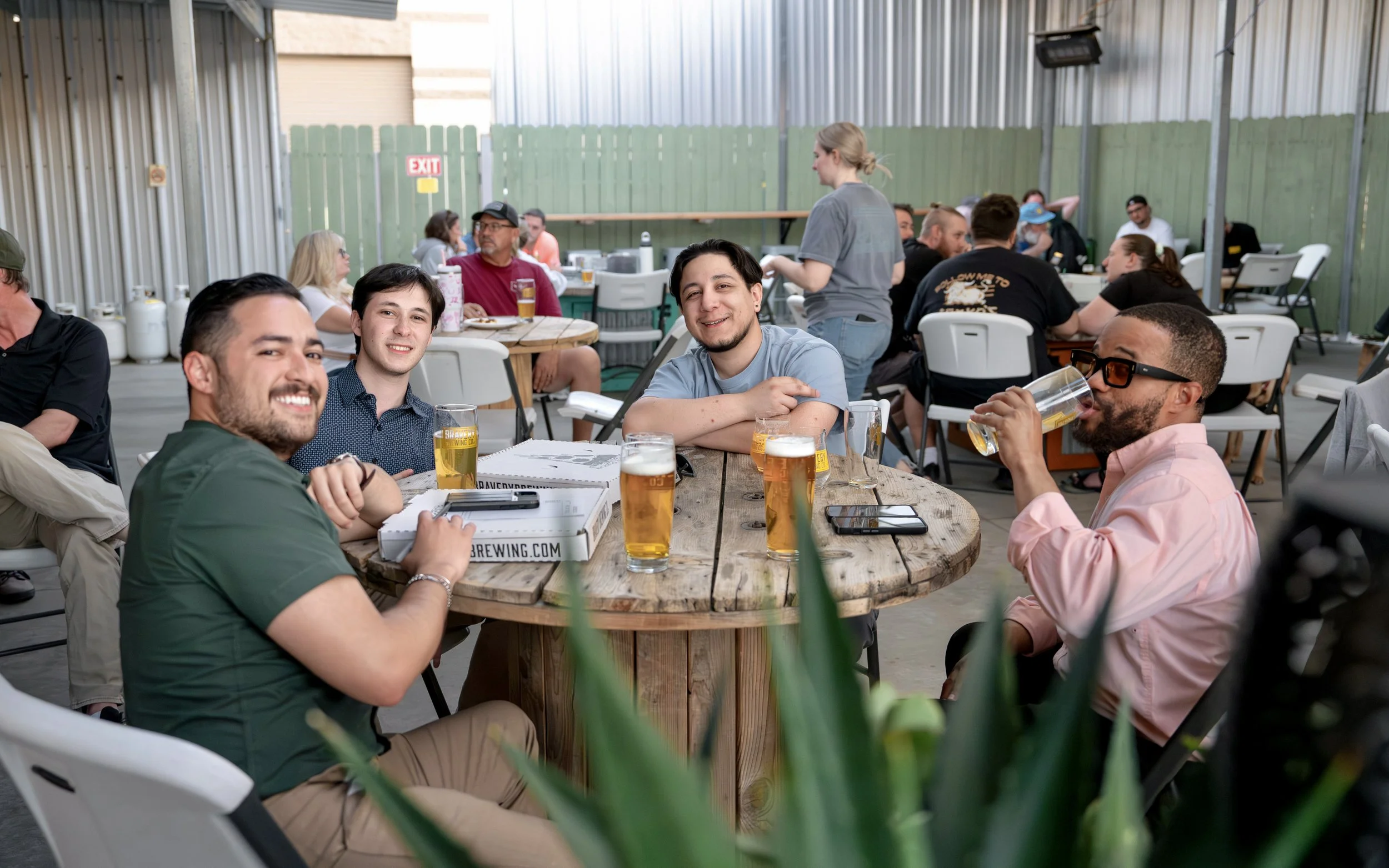 A photograph of a team playing No Bullshit trivia