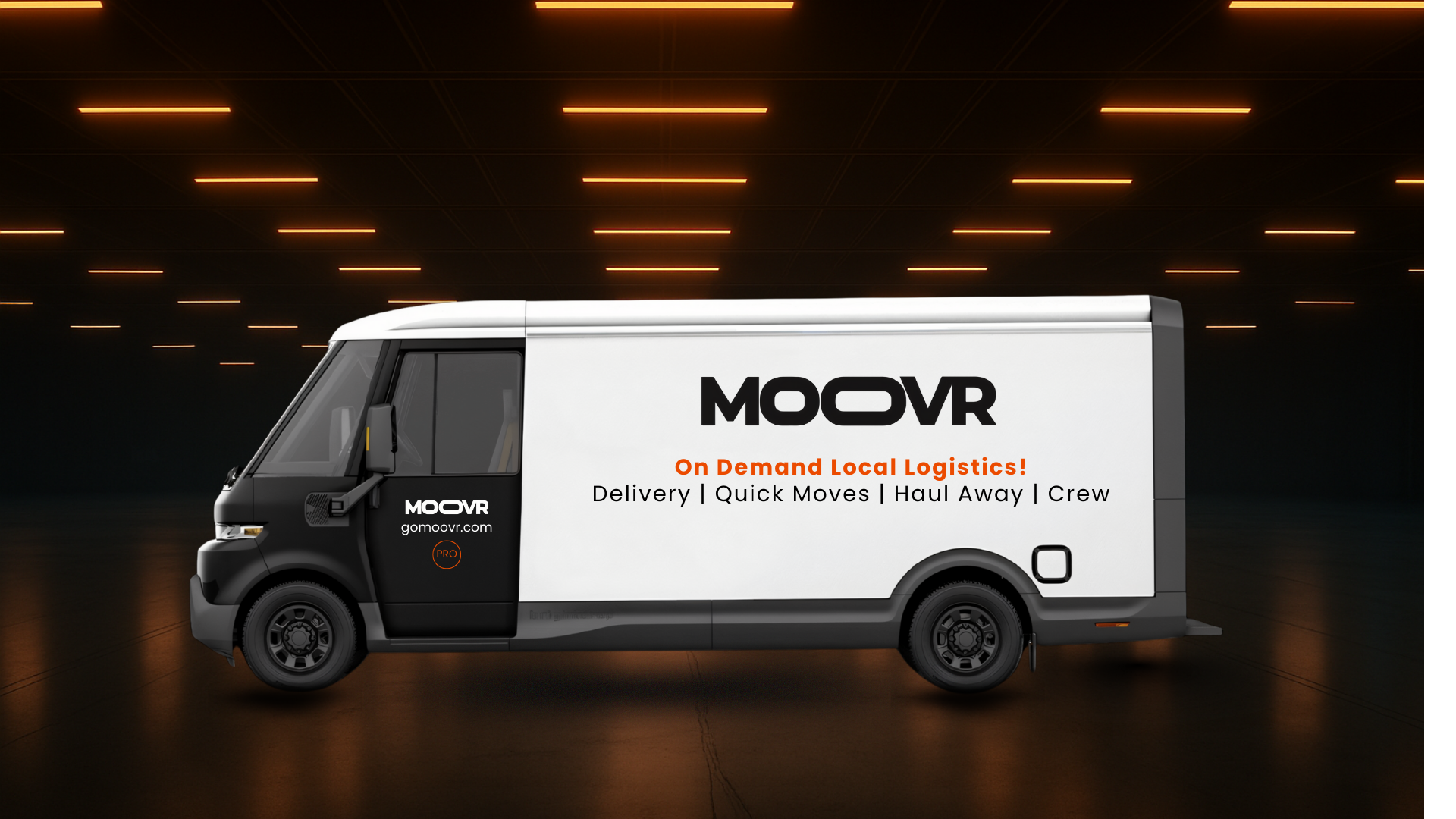 A modern cargo delivery truck with the logo MOOVR and advertising for on-demand local logistics services, including delivery, quick moves, haul away, and crew, parked in a dimly lit indoor space with orange glowing ceiling lights.