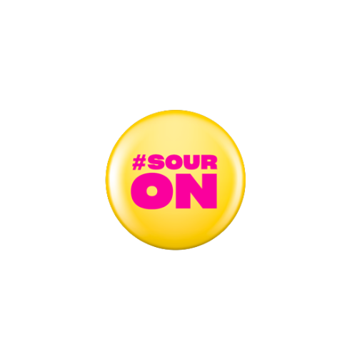 A yellow candy with pink text that reads '#SOUR ON'.