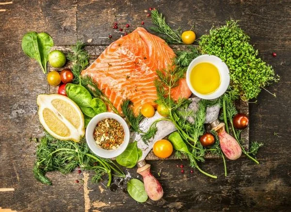 salmon herbs and healthy vegetables