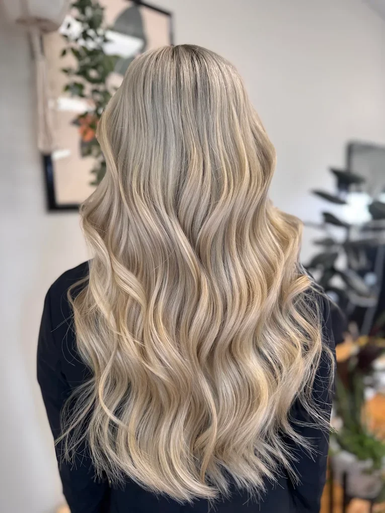 Dimensional blonde hair with soft highlights and natural movement
